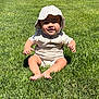 Joel is registered to the contest to win money with this photo: baby, child, grass, outdoor, sun_hat, romper, smiling, barefoot, greenery, sunlight, soccer_ball, wall, playful, summer, cute, infant, nature, sitting, daytime, happy