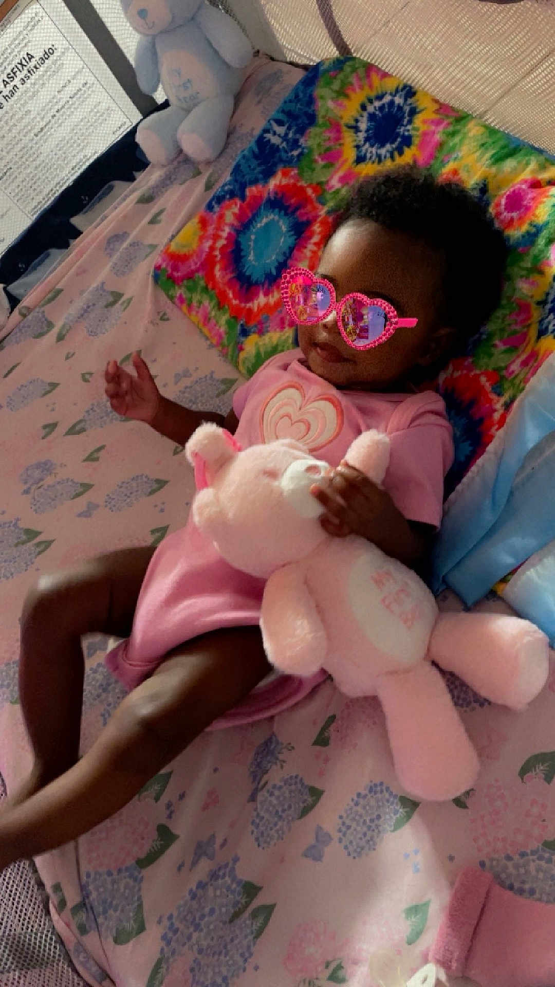Symphony joined the competition — help win amazing prizes! accessories, baby, bed, bedroom, couch, cushion, face, furniture, glasses, head, homedecor, indoors, person, photography, portrait, quilt, room, sunglasses, teddybear, toy