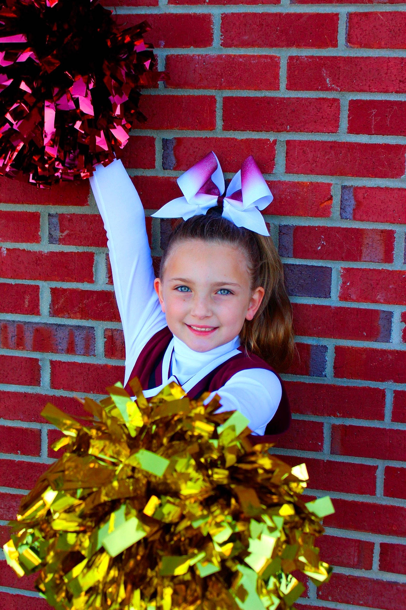 Brayleigh is registered to the contest to win money with this photo: brick, costume_hat, electric_blue, event, facial_expression, fashion_accessory, grass, happy, head, joy, leaf, magenta, people_in_nature, person, petal, photograph, pink, red, smile, snapshot