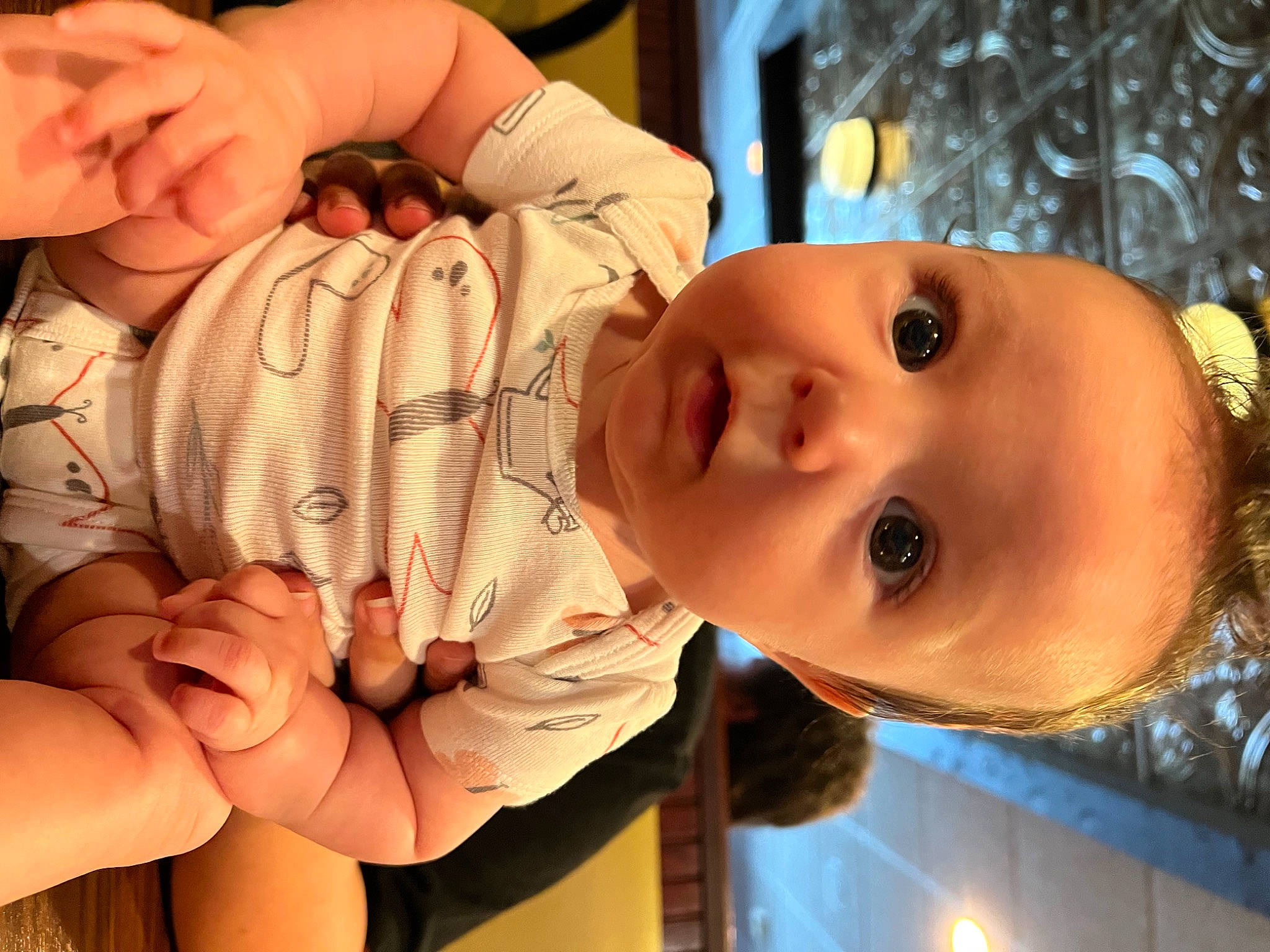 Octavia is registered to the contest to win money with this photo: baby, baby_toddler_clothing, cheek, child, ear, eye, eyelash, facial_expression, finger, gesture, hand, happy, human_body, lip, mouth, nose, person, skin, smile, thumb