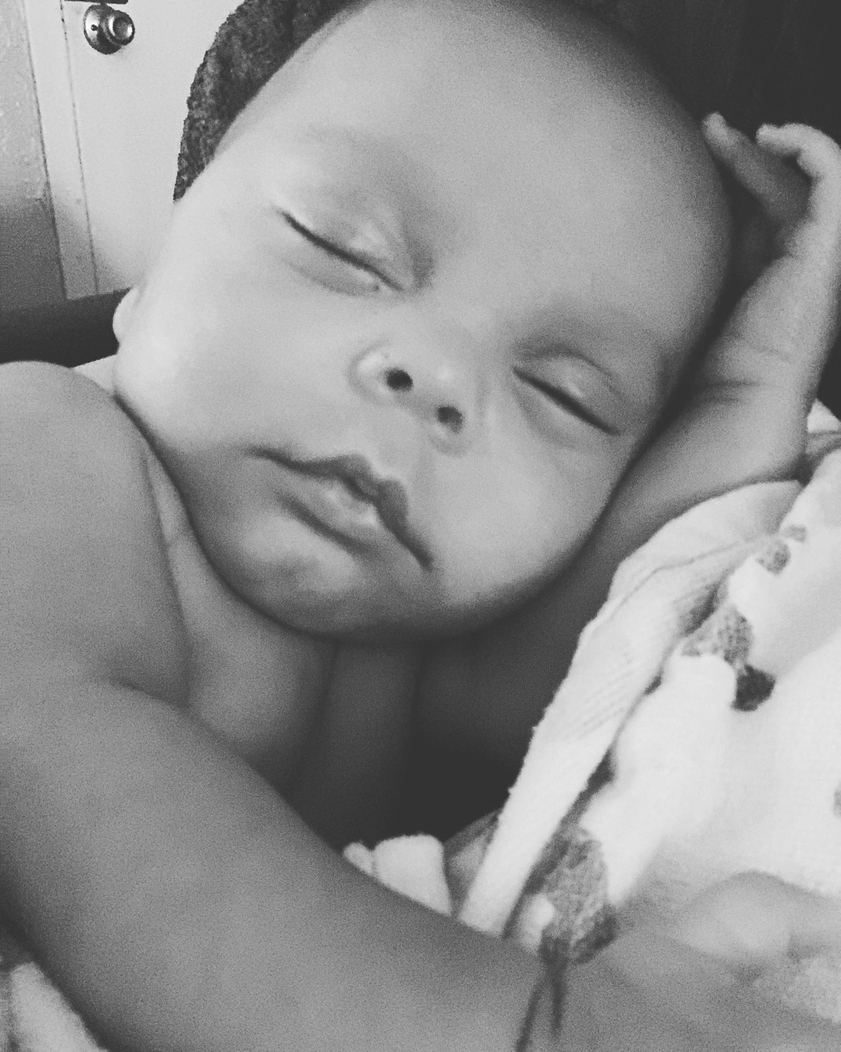 Kylan joined the competition — help win amazing prizes! baby, baby_sleeping, black, cheek, comfort, eyebrow, eyelash, facial_expression, finger, gesture, hand, happy, human, lip, mouth, muscle, nose, organ, person, photograph