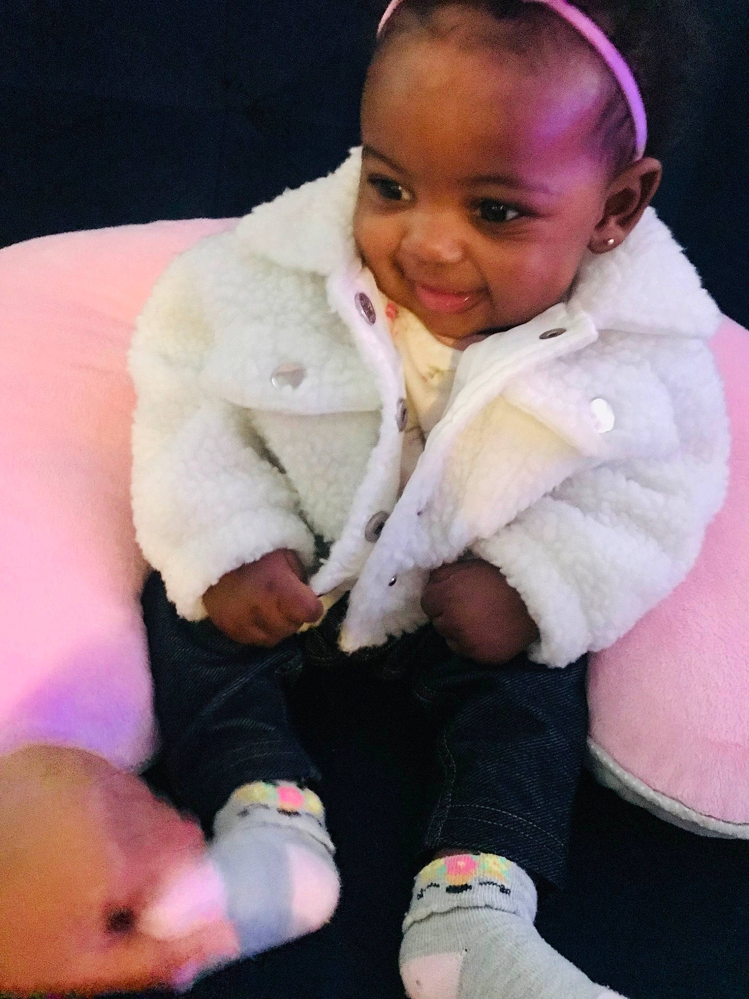 Amirah is registered to the contest to win money with this photo: baby, baby_toddler_clothing, cheek, child, comfort, eye, eyebrow, finger, human_body, jacket, joy, lip, mouth, neck, nose, person, pink, skin, sleeve, smile