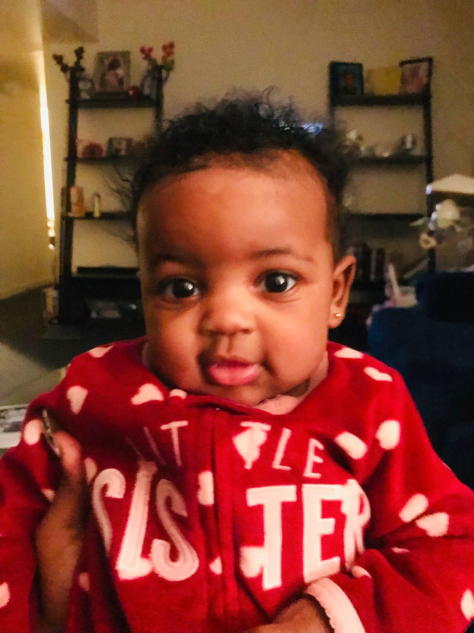 Amirah is registered to the contest to win money with this photo: baby_toddler_clothing, black_hair, cheek, child, ear, eyebrow, eyelash, forehead, fun, gesture, hairstyle, happy, lip, mouth, nose, person, skin, sleeve, t_shirt, thumb