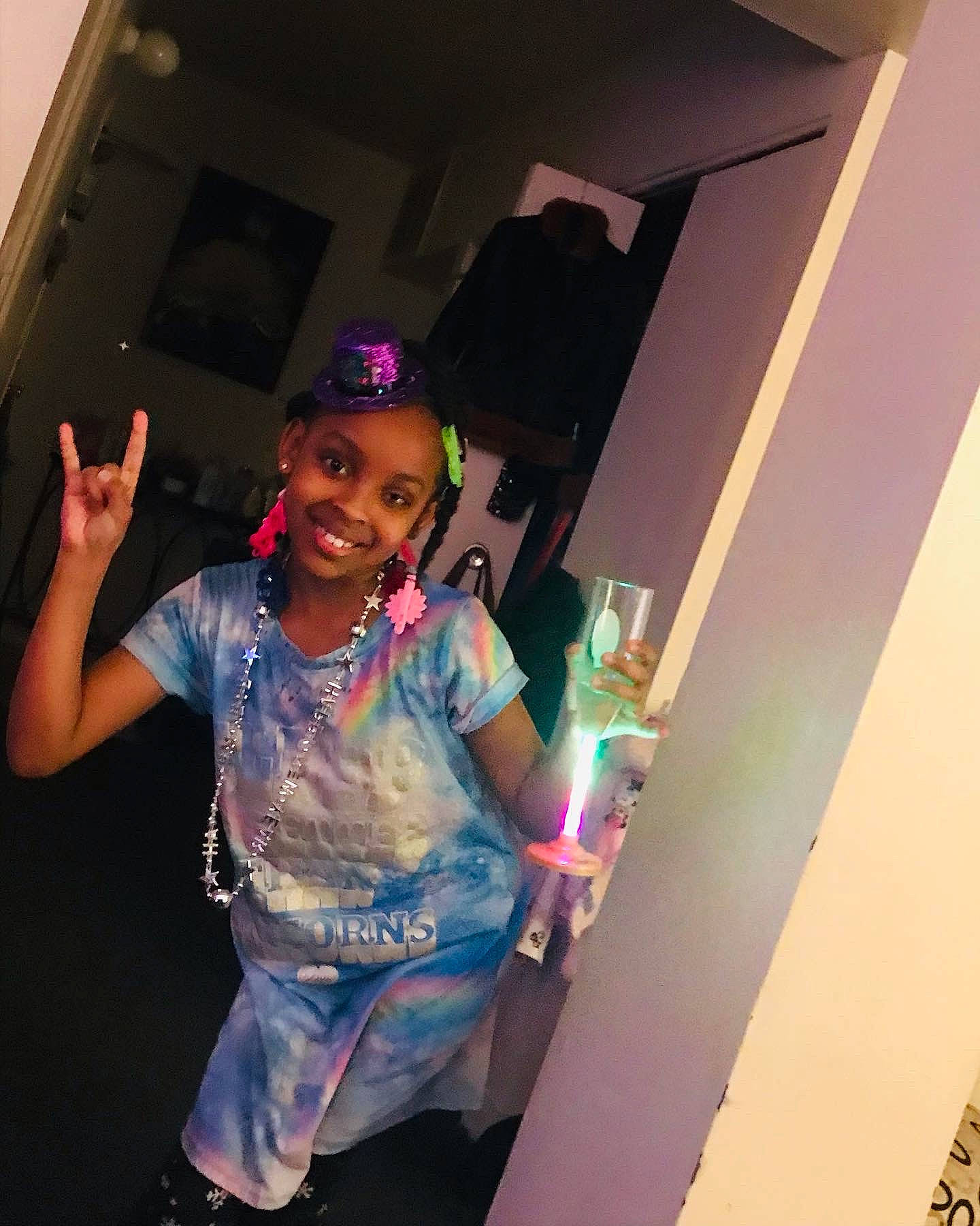Bryleigh is registered to the contest to win money with this photo: artist, dance, electric_blue, entertainment, event, fashion_design, flash_photography, fun, gesture, happy, hat, joy, magenta, performing_arts, person, pink, purple, room, smile, t_shirt