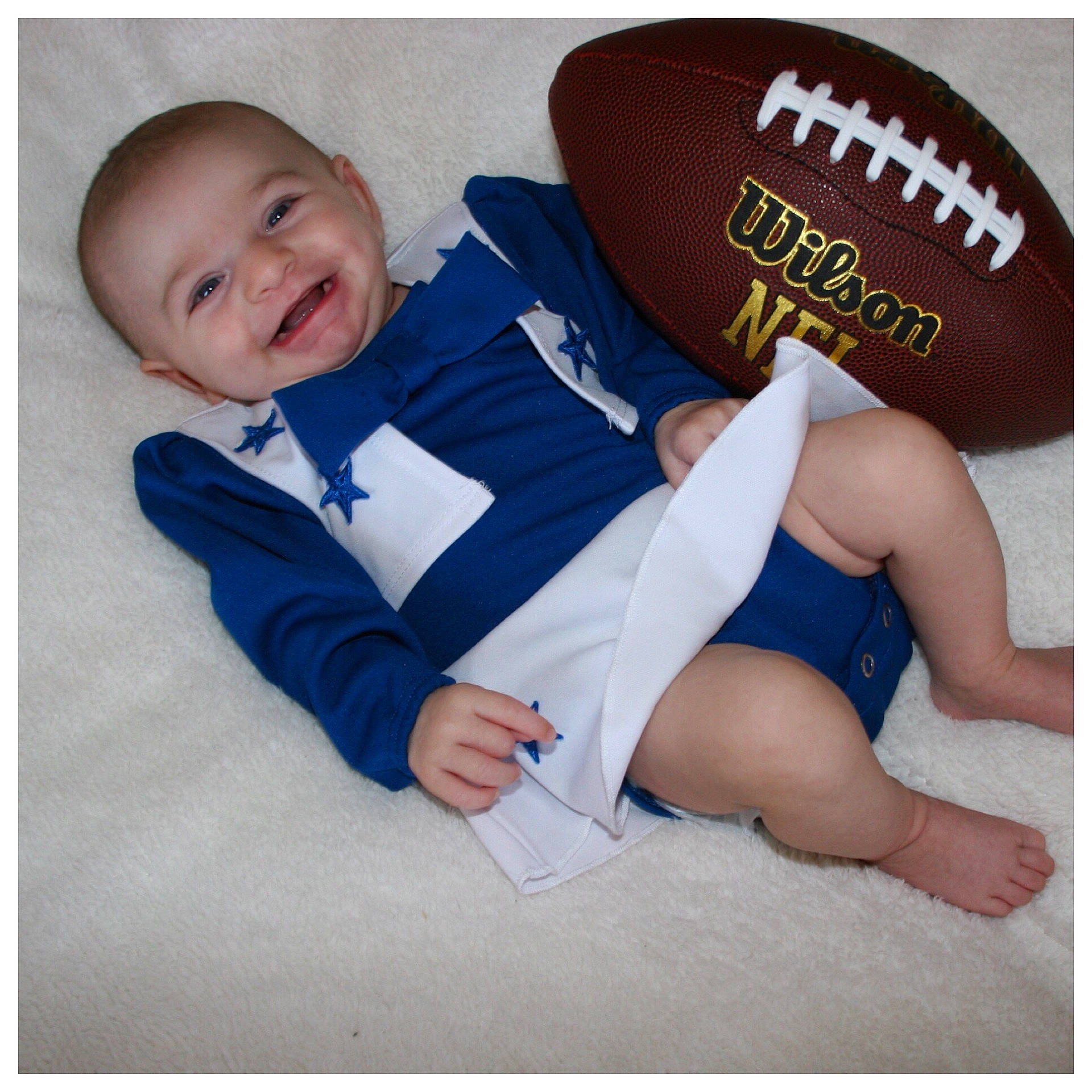 Bailee is registered to the contest to win money with this photo: arm, baby_products, blue, boy, child, footwear, fun, infant, joint, leg, material, person, product, shoe, smile, toddler