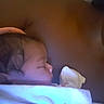 Amani is registered to the contest to win money with this photo: baby, sleeping, blanket, infant, closeup, skin, face, peaceful, cuddle, resting, soft, comfort, newborn, person, portrait, cozy, warm, head, child, tender