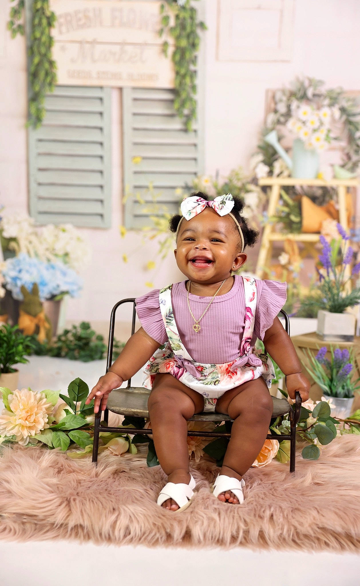Jelani joined the competition — help win amazing prizes! baby, baby_toddler_clothing, chair, child, event, fashion_accessory, fun, grass, happy, headpiece, jewellery, joy, leisure, magenta, pattern, person, personal_protective_equipment, plant, sitting, smile