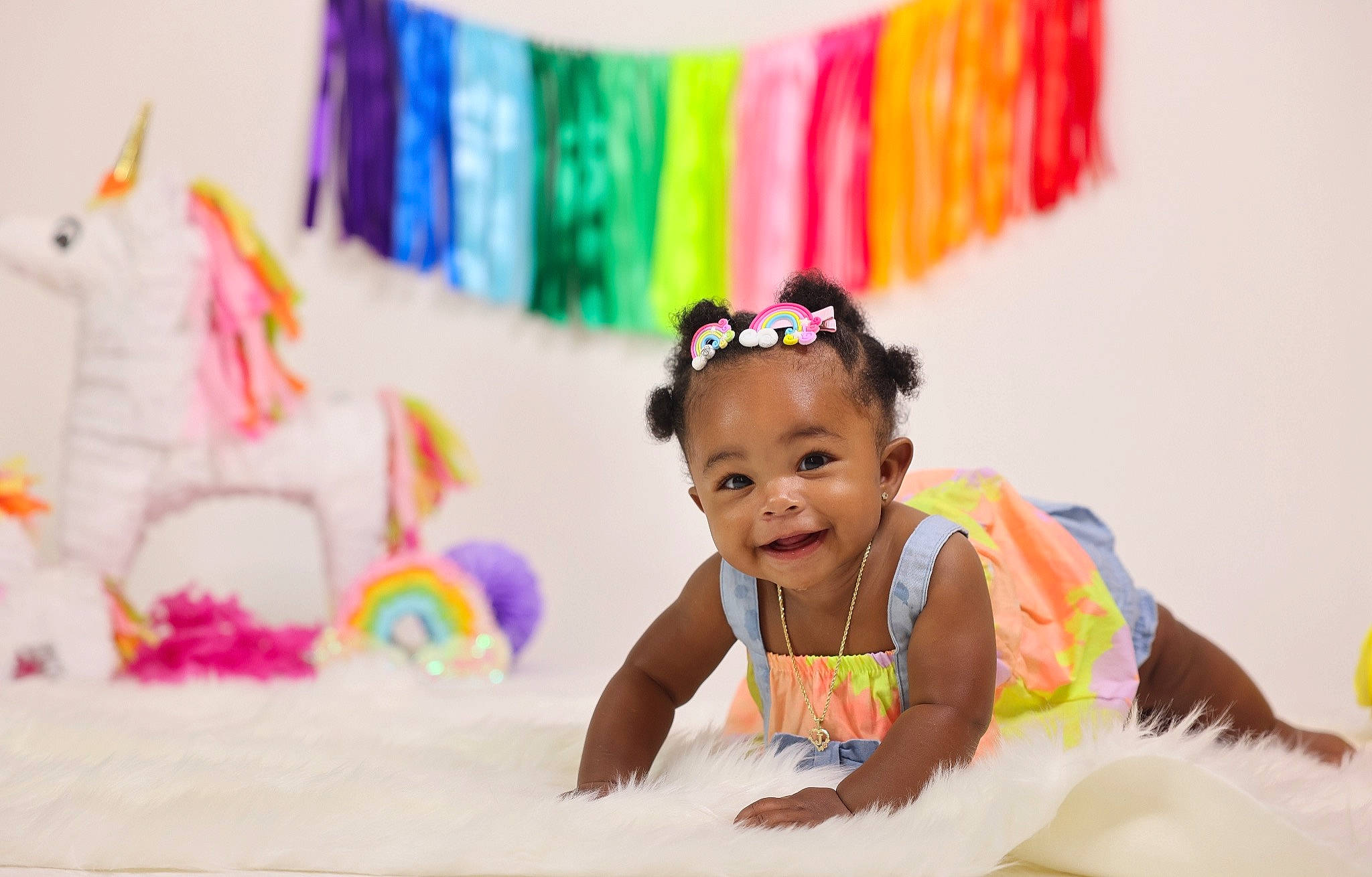 Jelani is registered to the contest to win money with this photo: art, baby, baby_toddler_clothing, barefoot, beauty, child, event, fun, happy, joy, leisure, magenta, party_supply, people, person, pink, recreation, room, smile, snapshot