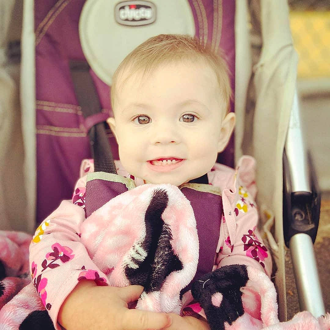 Breanna joined the competition — help win amazing prizes! baby, baby_carriage, baby_toddler_clothing, cheek, child, comfort, eye, finger, gesture, happy, human_body, iris, joy, people, person, photograph, pink, purple, skin, smile