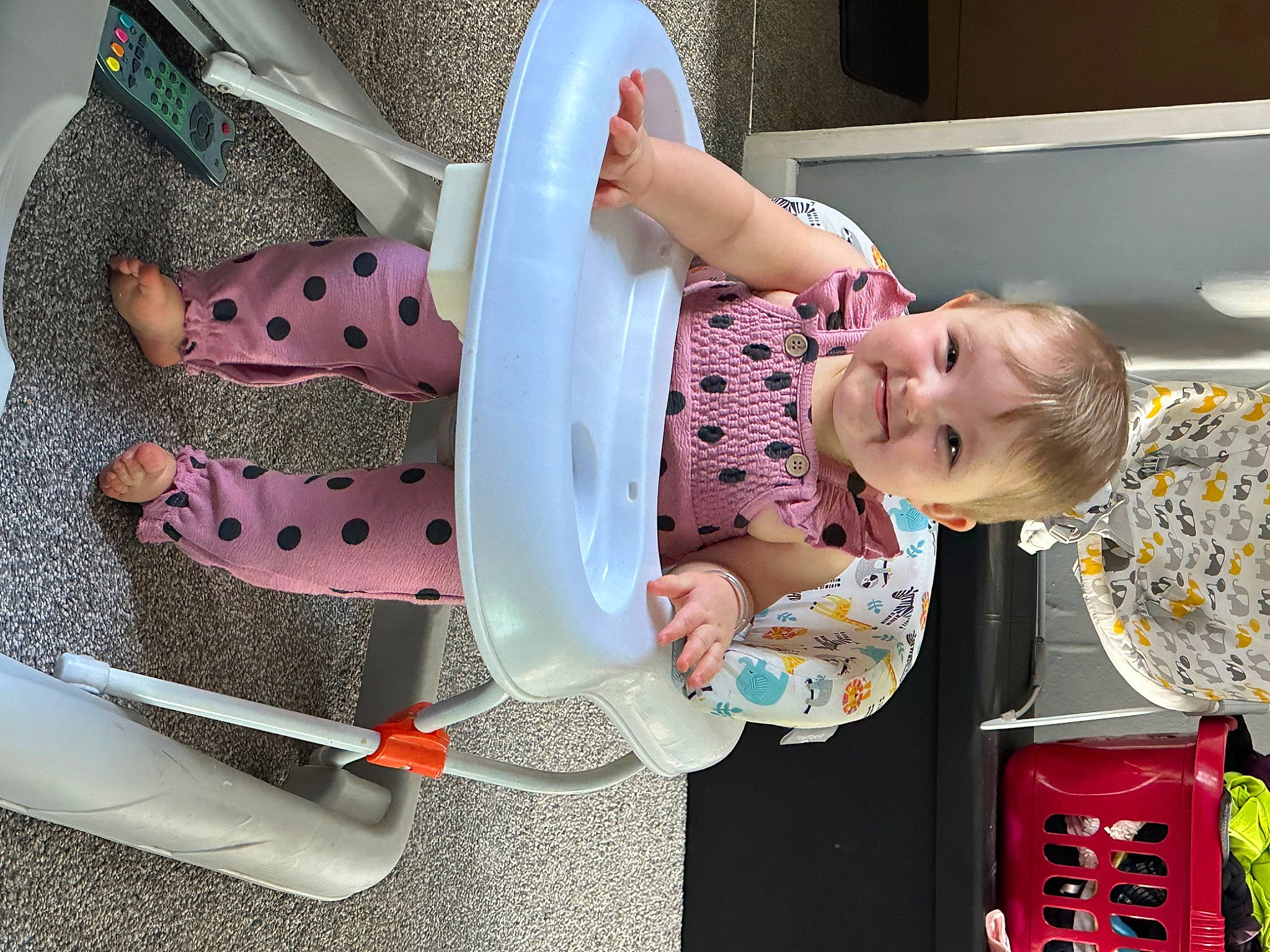 Evie is registered to the contest to win money with this photo: baby, baby_products, baby_toddler_clothing, baby_toys, child, event, fun, happy, joy, leisure, pattern, person, pink, play, room, sitting, textile, toddler