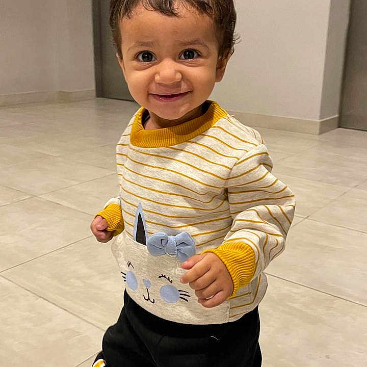 Minal is registered to the contest to win money with this photo: accessories, baby, babylaughing, basin, bathroom, blackhair, blazer, bodypart, bowtie, brownhair, clothing, coat, costume, dimples, door, face, finger, footwear, formalwear, hair