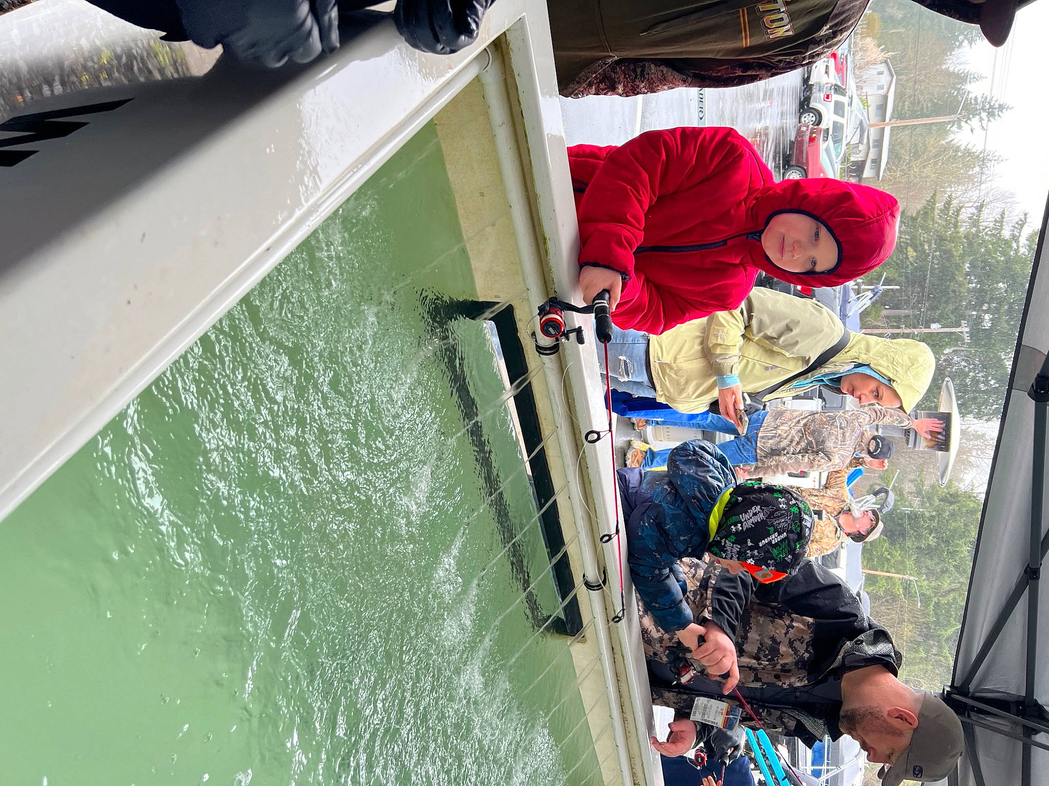 Dalton joined the competition — help win amazing prizes! boats_and_boating_equipment_and_supplies, flooring, fun, hat, headwear, lake, leisure, mode_of_transport, person, recreation, travel, tree, vacation, water, water_transportation, wood