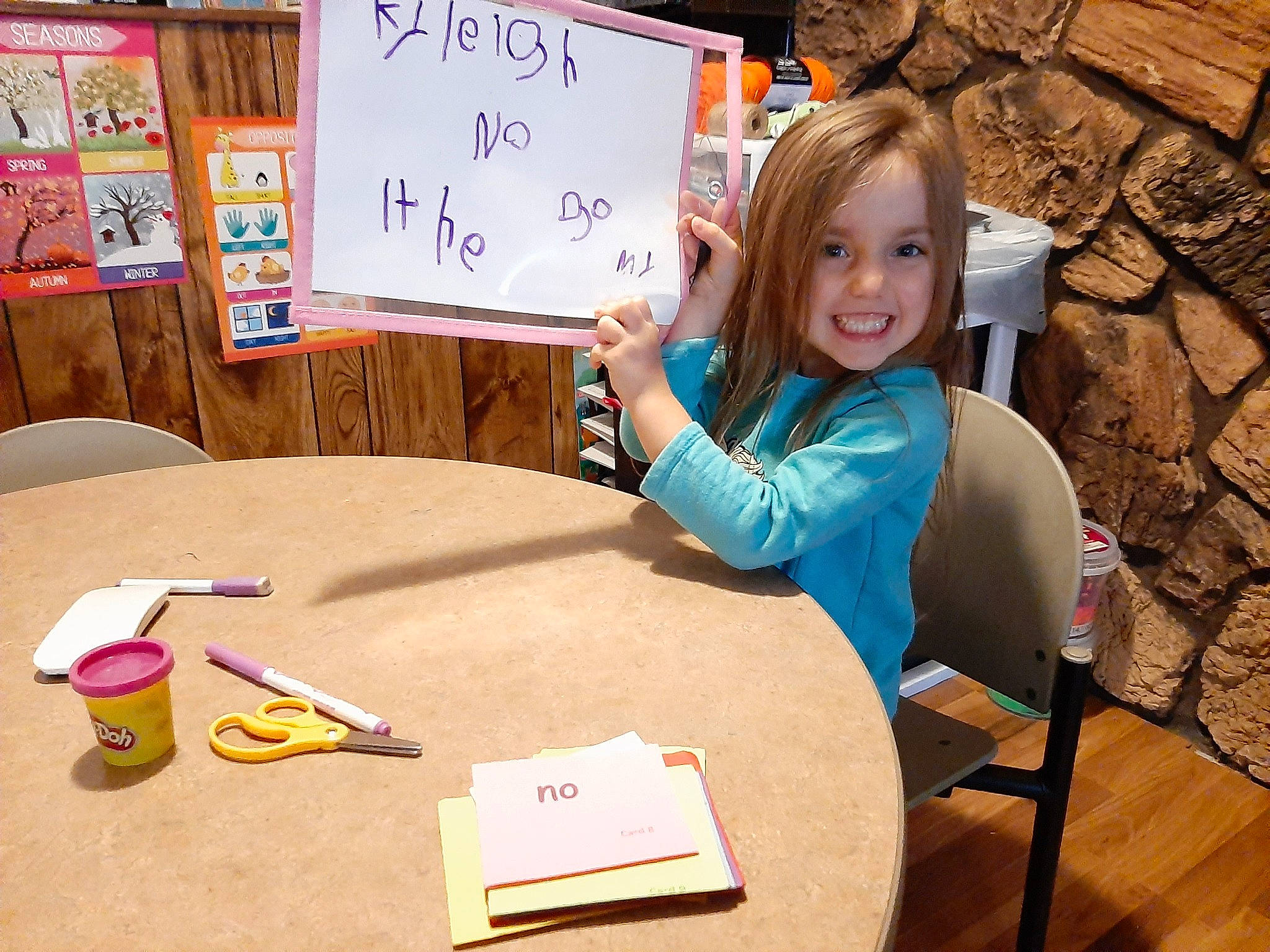 Kyleigh is registered to the contest to win money with this photo: chair, child_art, easel, handwriting, joy, laminate_flooring, learning, office_supplies, paper, paper_product, person, plywood, stationery, stone_wall, table, varnish, wood_flooring, writing