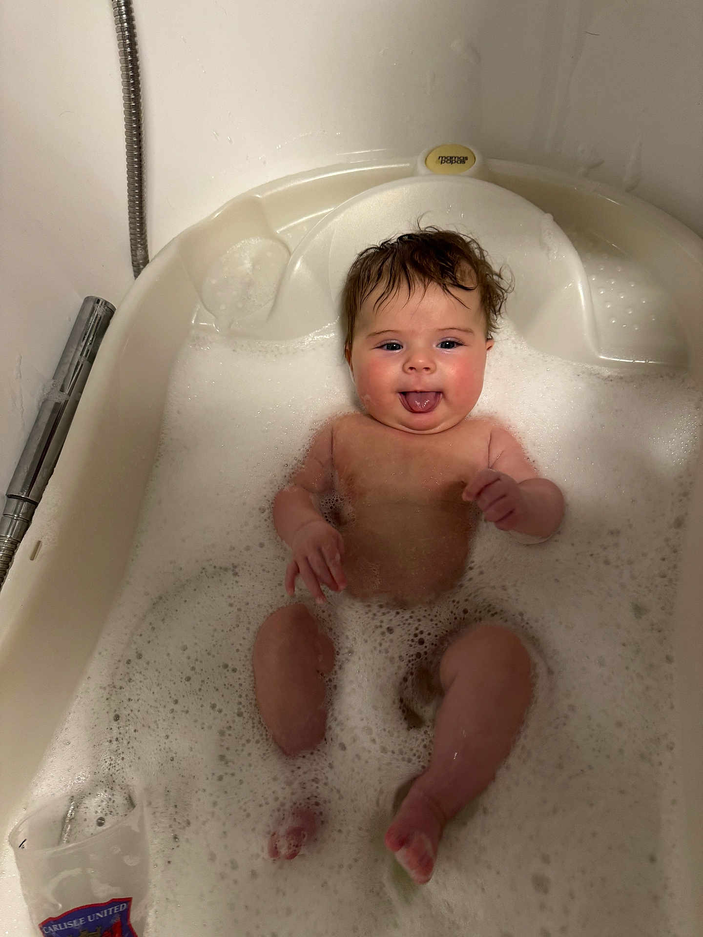 Harper joined the competition — help win amazing prizes! baby, bath, foam, water, bathtub, child, face, tongue, wet_hair, skin, cute, infant, playful, splash, happy, relaxing, indoors, clean, person, young_child