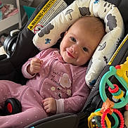 Hadley joined the competition — help win amazing prizes! baby, infant, child, smiling, portrait, car_seat, pink_outfit, baby_toys, rattle, indoor, home, nursery, seated, happy, face, eyes, playtime, floral_pattern, baby_gear, candid_photo