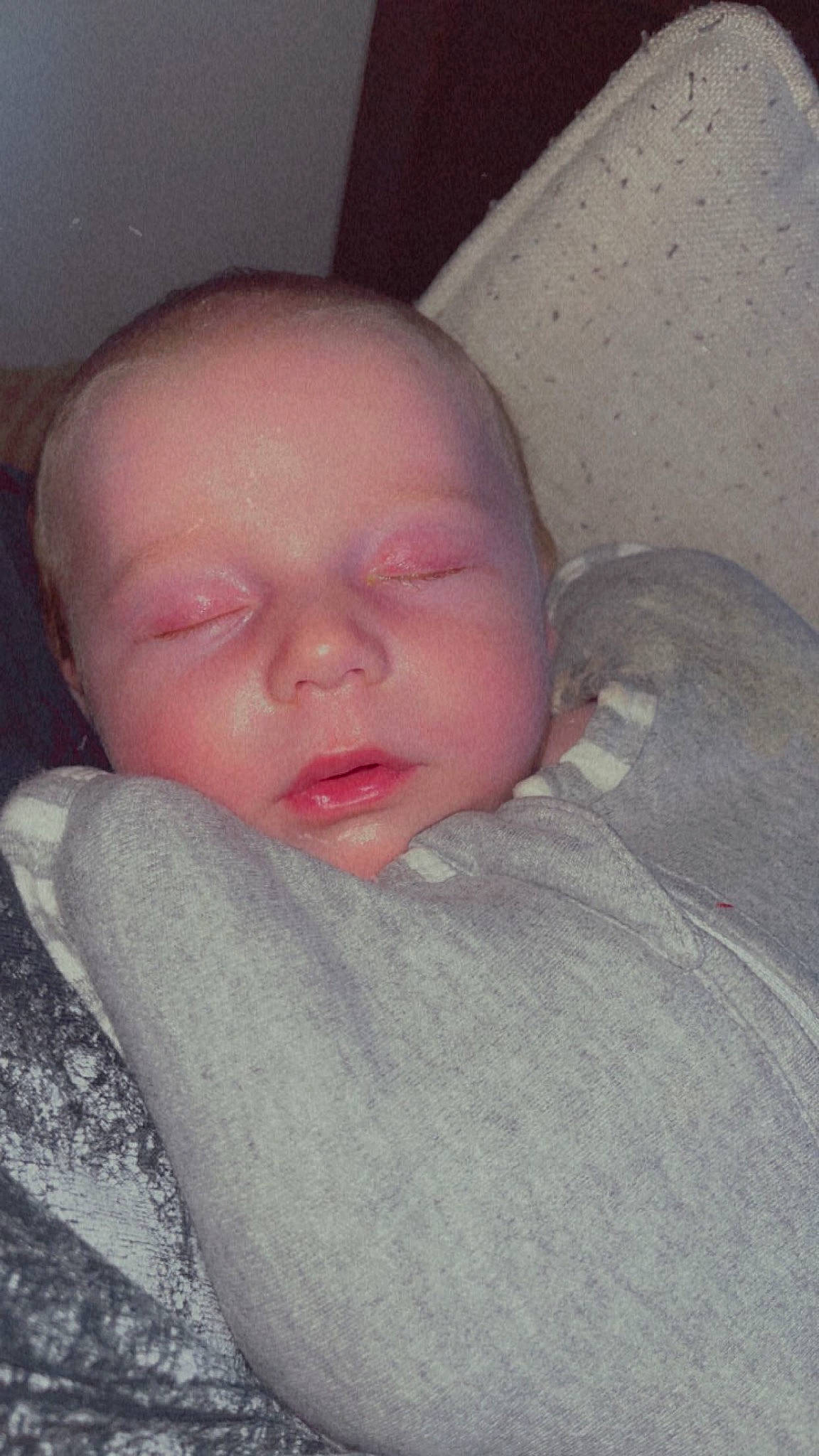 Elizabeth is registered to the contest to win money with this photo: baby, cheek, child, chin, close_up, comfort, ear, eye, eyebrow, face, finger, forehead, head, iris, linens, lip, mouth, nose, person, skin