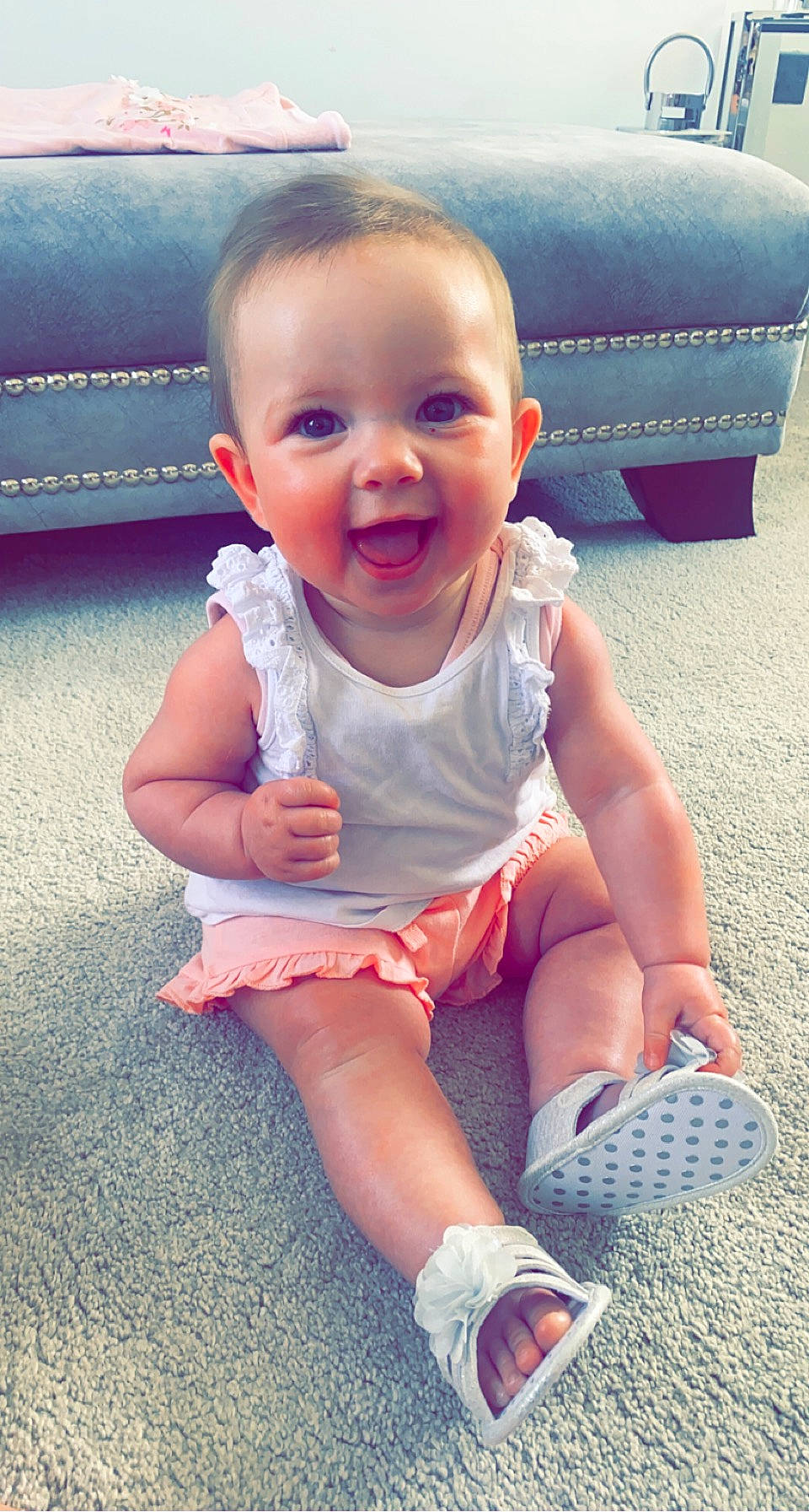 Isla-rose is registered to the contest to win money with this photo: baby_toddler_clothing, blue, cheek, eye, face, facial_expression, finger, hairstyle, happy, head, joint, leg, mouth, person, pink, shorts, skin, sleeve, smile, standing