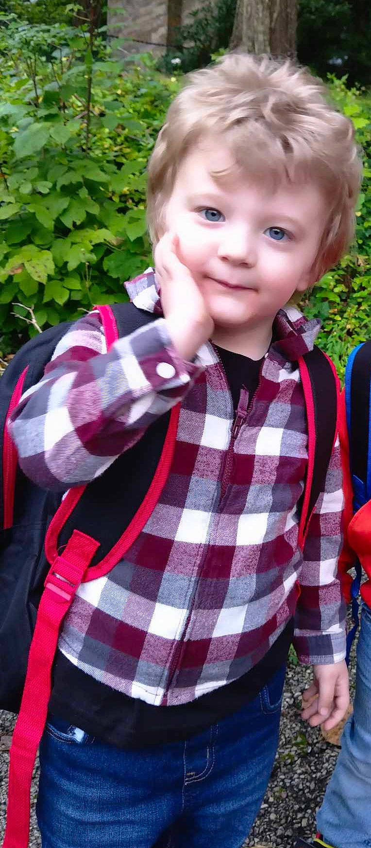 Thomas is registered to the contest to win money with this photo: baby_toddler_clothing, collar, dress_shirt, eye, grass, happy, head, joy, lip, people_in_nature, person, photograph, plaid, plant, red, sleeve, smile, t_shirt, tartan, textile