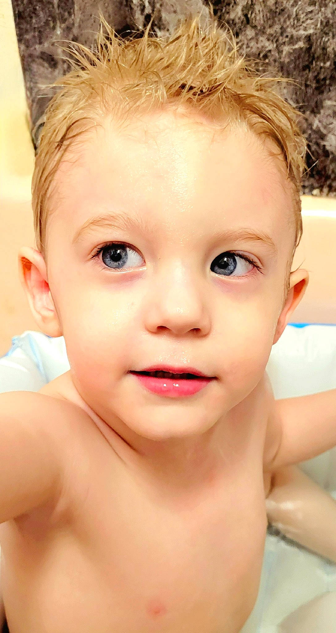 Isaiah is registered to the contest to win money with this photo: arm, cheek, chin, ear, eye, eyebrow, eyelash, facial_expression, forehead, hair, hairstyle, human_body, jaw, lip, mouth, neck, nose, person, shoulder, skin