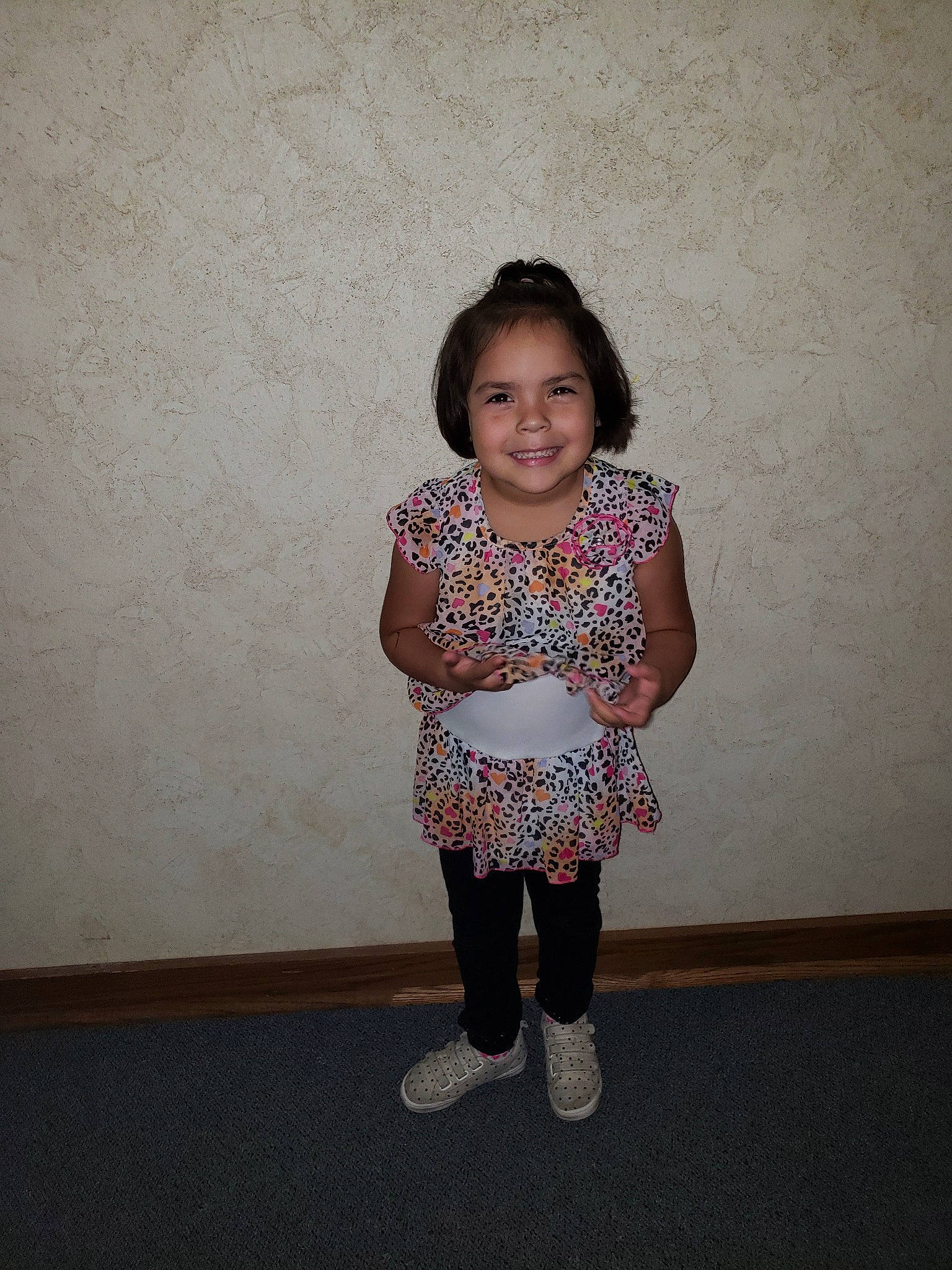 Joselyn is registered to the contest to win money with this photo: arm, child, clothing, day, dress, footwear, fun, girl, human_body, joy, leg, outerwear, person, pink, shoulder, skin, smile, snapshot, standing, textile