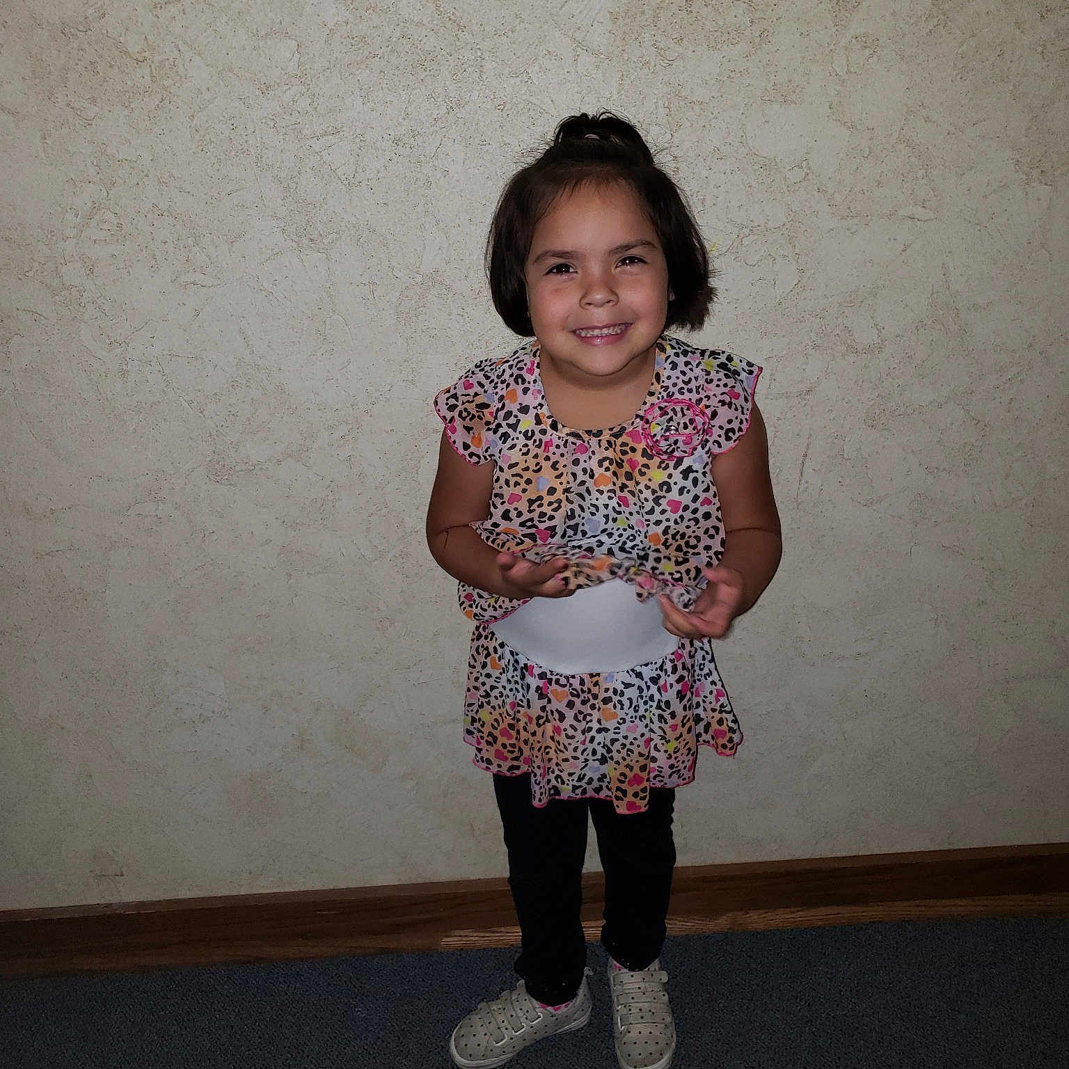 Joselyn is registered to the contest to win money with this photo: arm, child, clothing, day, dress, footwear, fun, girl, human_body, joy, leg, outerwear, person, pink, shoulder, skin, smile, snapshot, standing, textile