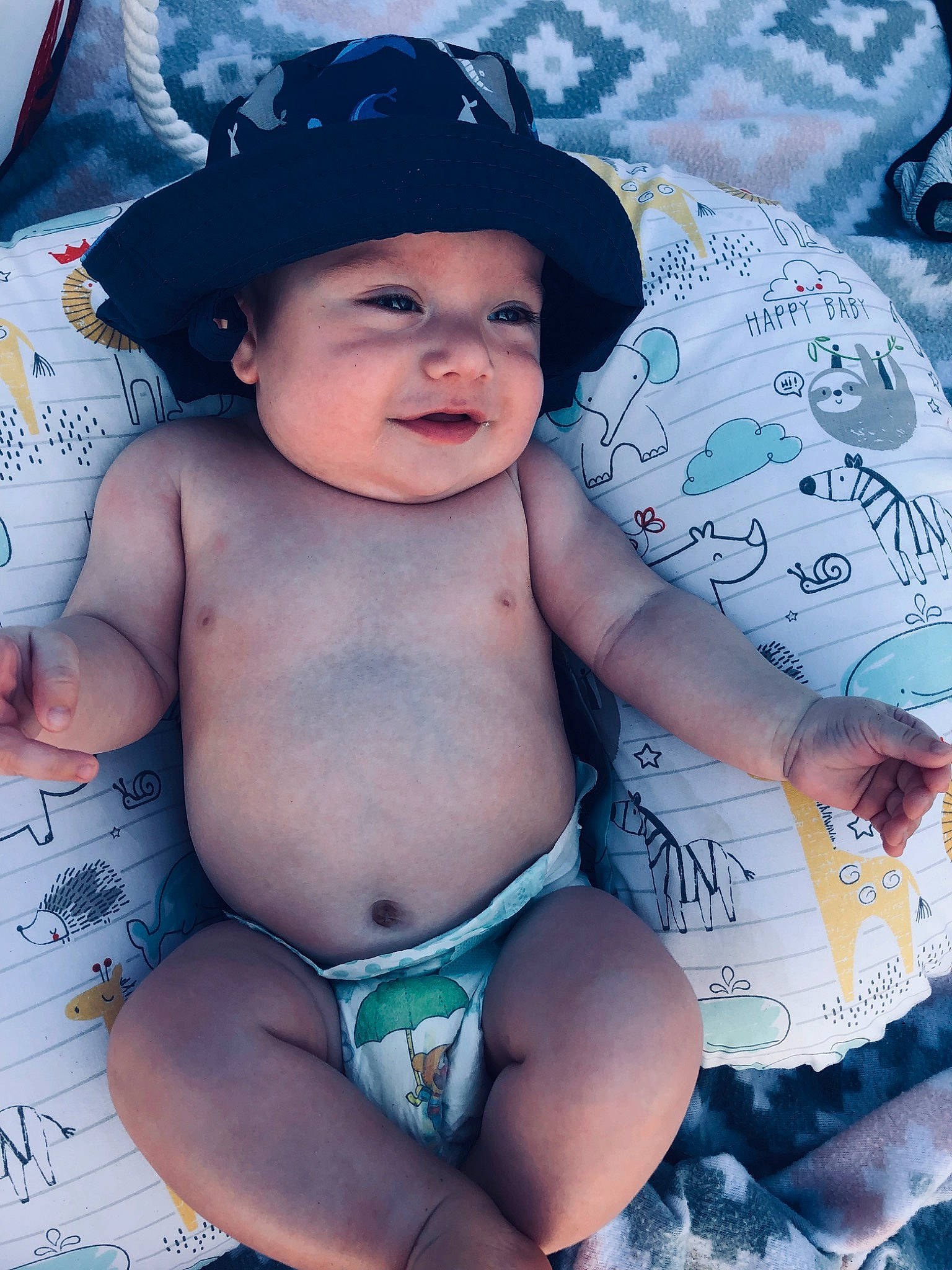 Koleson is registered to the contest to win money with this photo: baby, baby_products, black_hair, cheek, child, diaper, hat, headgear, person, product, skin, smile, toddler, vacation