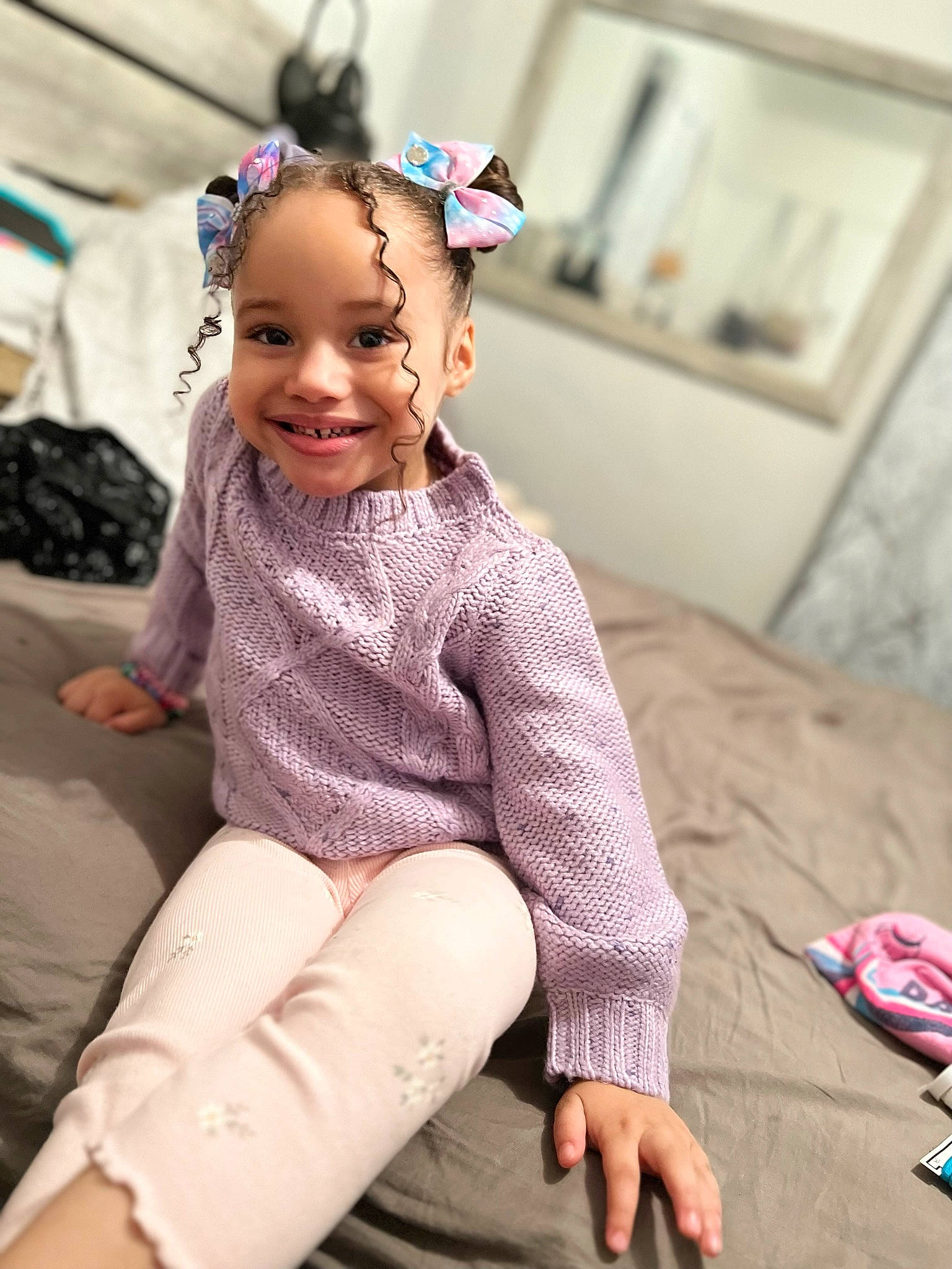 Jay Lanis is registered to the contest to win money with this photo: brown_hair, child, clothing, fashion_design, fun, happy, human_leg, jewellery, joy, knee, long_hair, magenta, neck, person, picture_frame, pink, sitting, skin, sleeve, smile