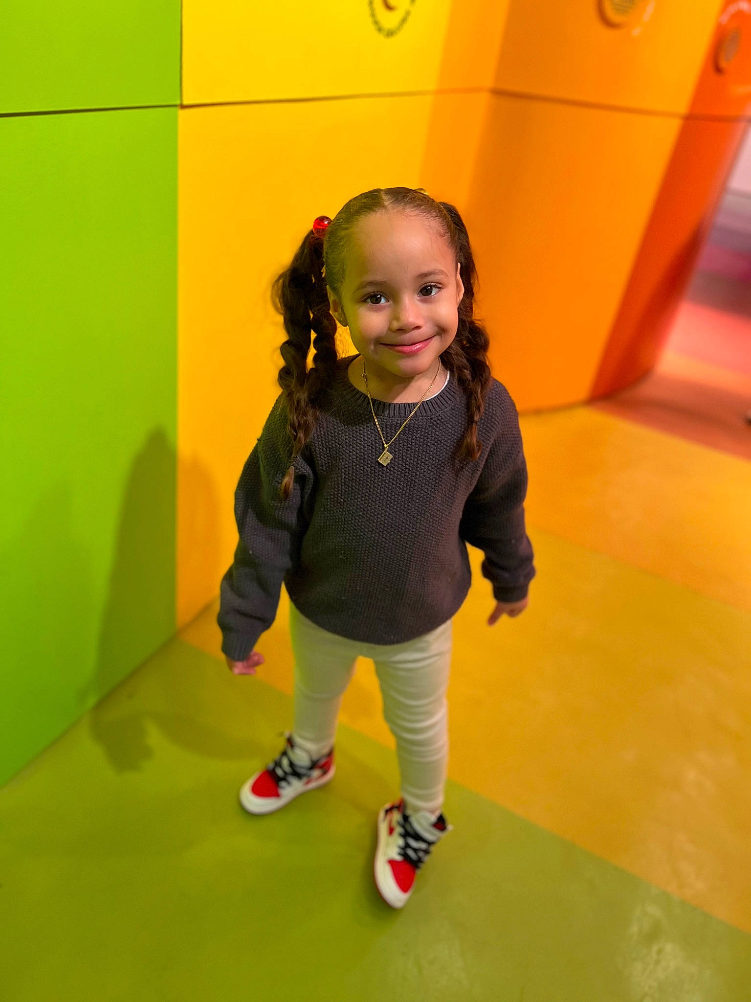 Jay Lanis joined the competition — help win amazing prizes! baby_toddler_clothing, child, child_model, electric_blue, flooring, fun, happy, joy, knee, leisure, magenta, outdoor_shoe, person, play, recreation, room, shoe, sleeve, smile, sneakers
