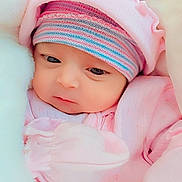 Zirwa is registered to the contest to win money with this photo: baby, newborn, infant, pink_clothing, hat, striped_hat, blanket, soft_texture, cute, face, eyes, sleepwear, cozy, child, portrait, young_child, warm, resting, bundle, closeup