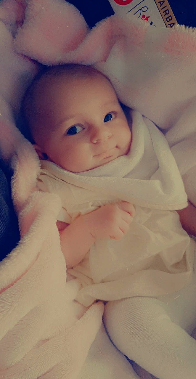 Lola-rose is registered to the contest to win money with this photo: baby, bedtime, cheek, child, doll, eye, face, head, iris, lip, mouth, person, pink, skin, toddler, toy