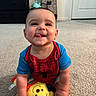 Jackson joined the competition — help win amazing prizes! baby, child, crawling, carpet, plush_toy, yellow_toy, spiderman_outfit, smiling, tongue_out, indoor, room, furniture, door, suitcase, drawer, cute, happy, person, infant, playful