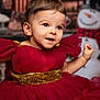 Gina participe au concours pour gagner de l'argent avec cette photo : toddler, child, dress, red_dress, gold_belt, happy, smile, holiday, christmas, snowman, celebration, portrait, indoor, festive, cute, face, person, background, decorations, young_child