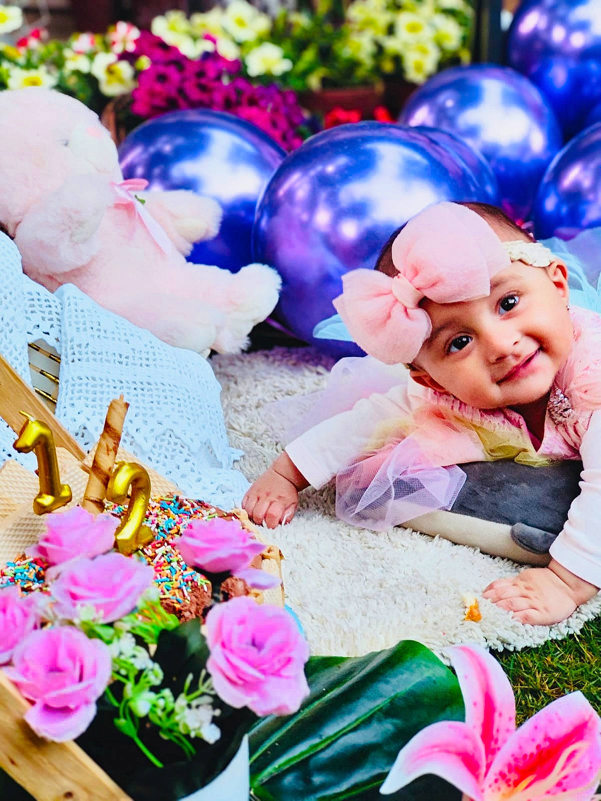 Amber is registered to the contest to win money with this photo: balloon, beauty, cut_flowers, electric_blue, event, flower, flower_arranging, fun, happy, headwear, hybrid_tea_rose, joy, magenta, party_supply, person, petal, photograph, pink, purple, rose