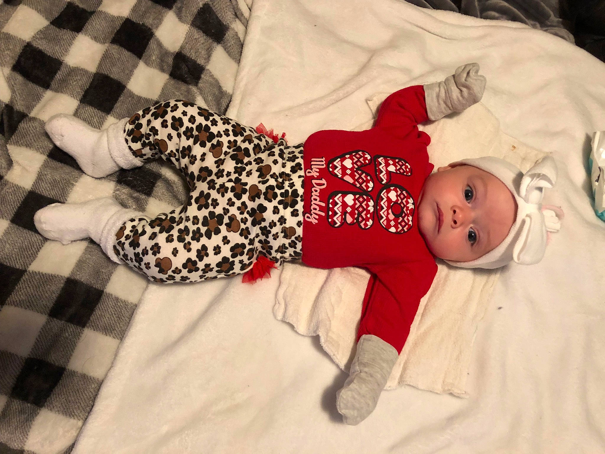 Athena joined the competition — help win amazing prizes! baby, baby_products, baby_toddler_clothing, child, comfort, flooring, fun, hat, headwear, human_leg, linens, pattern, person, plaid, room, sleeve, smile, sock, tartan, textile