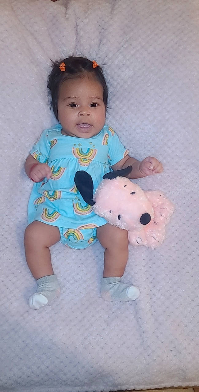 Kamila joined the competition — help win amazing prizes! baby, baby_toddler_clothing, baby_toys, child, face, foot, fun, happy, head, pattern, person, pink, sitting, skin, sleeve, stuffed_toy, textile, toddler, toy