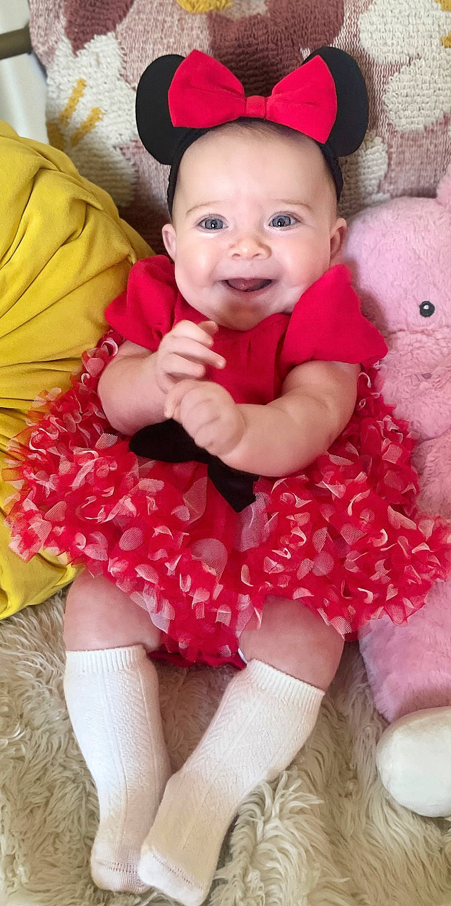 Mila is registered to the contest to win money with this photo: baby, baby_toddler_clothing, beauty, child, day_dress, dress, face, finger, happy, magenta, pattern, person, pink, purple, skin, sleeve, smile, textile, thigh, toddler