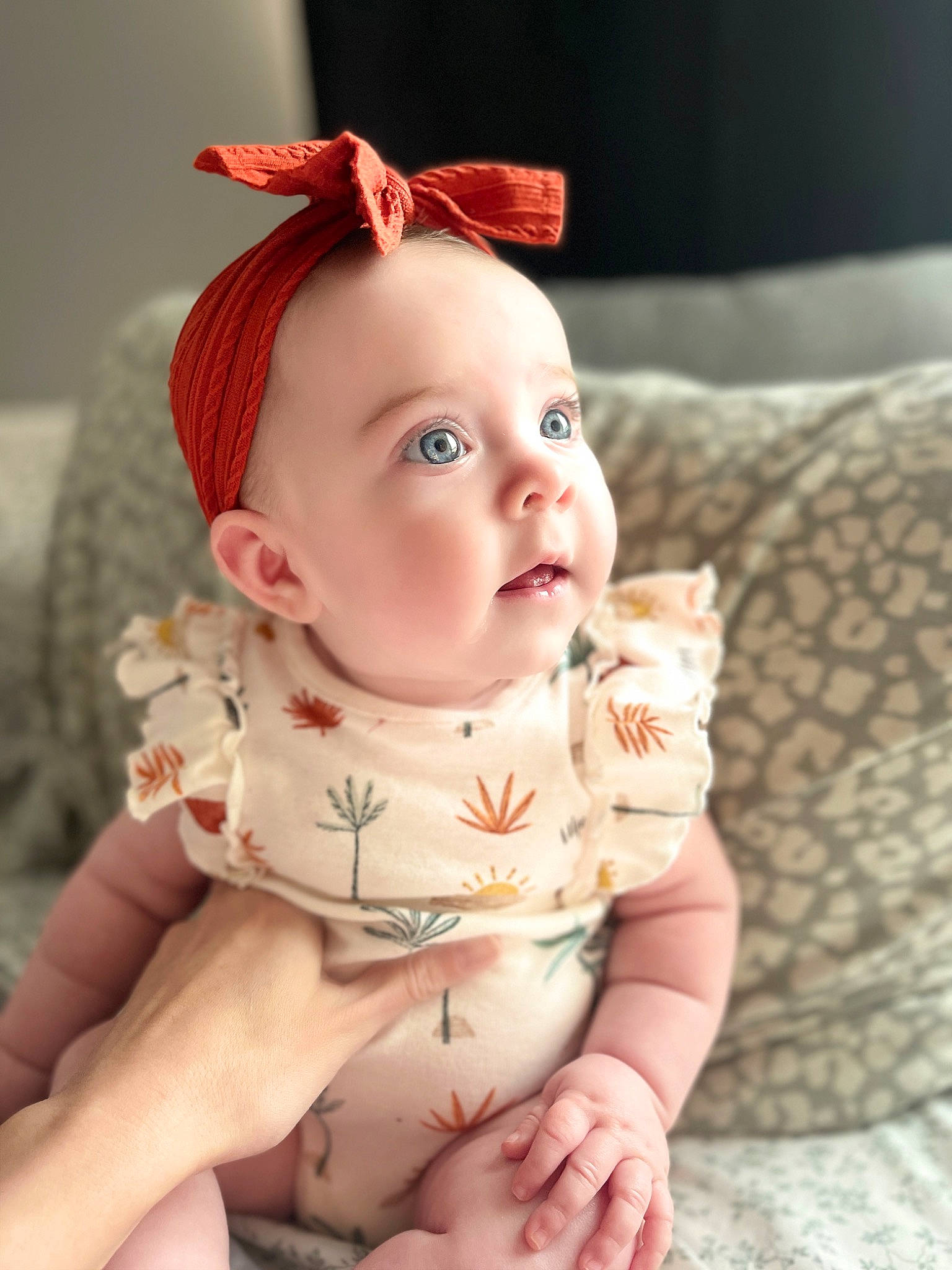 Mila is registered to the contest to win money with this photo: baby, baby_toddler_clothing, cheek, child, chin, comfort, eye, face, happy, head, human_body, iris, lip, mouth, person, pink, skin, sleeve, stomach, textile