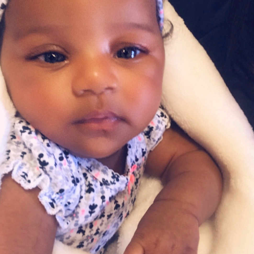 Amariana is registered to the contest to win money with this photo: baby, beauty, cheek, child, chin, eye, eyebrow, face, finger, forehead, hair_accessory, hand, head, headgear, lip, mouth, nose, person, skin, smile