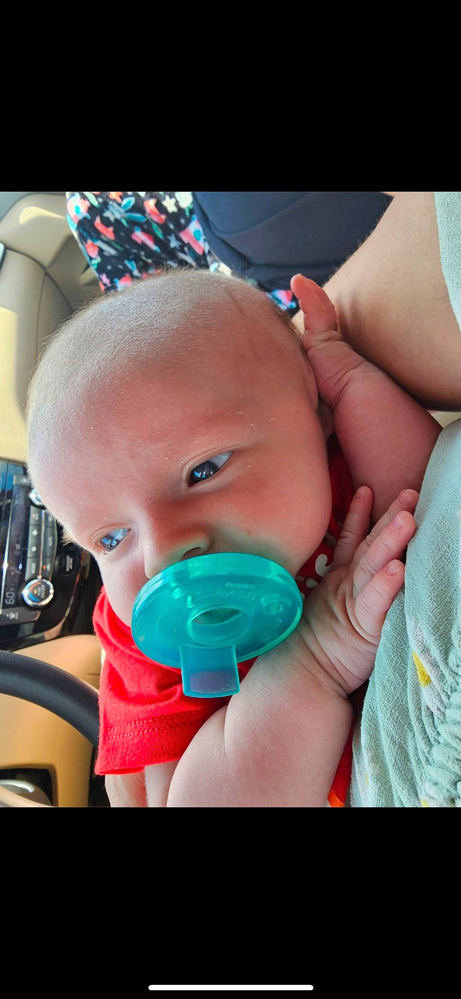 Shelby is registered to the contest to win money with this photo: azure, baby, baby_toddler_clothing, cheek, drinkware, eyelash, face, finger, gesture, hand, head, iris, lip, mouth, nail, nose, person, pink, product, skin