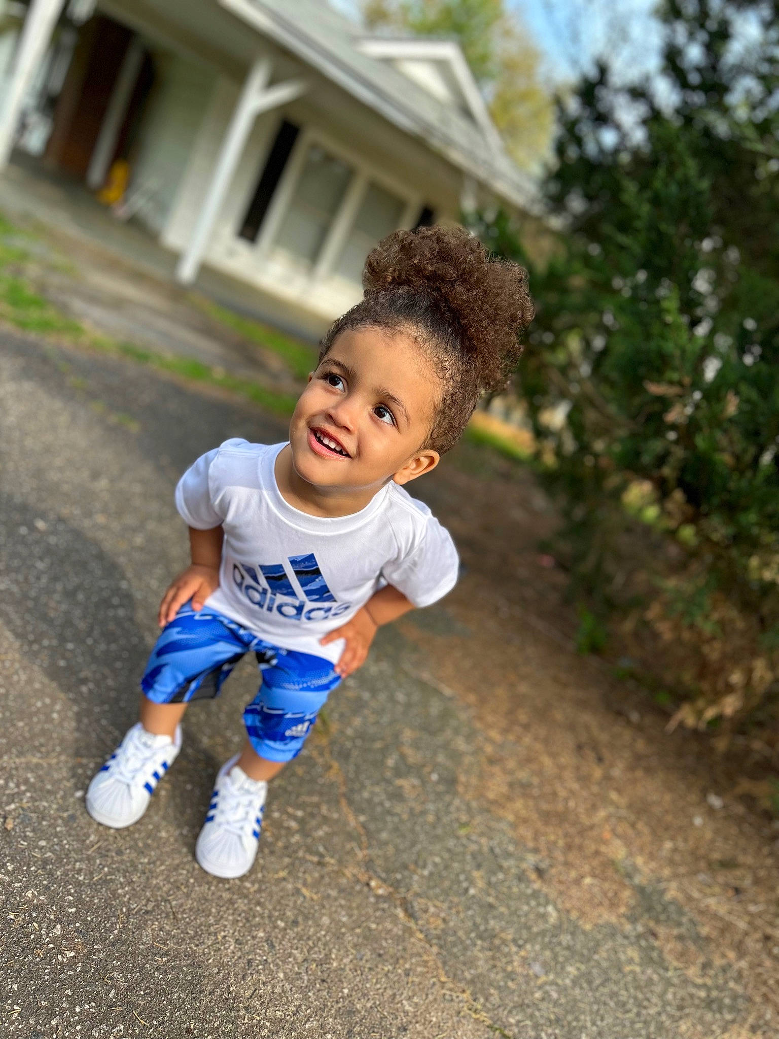 Jeremiah is registered to the contest to win money with this photo: asphalt, baby, baby_toddler_clothing, child, denim, electric_blue, flash_photography, fun, grass, happy, joy, leisure, people_in_nature, person, plant, recreation, road, smile, soil, t_shirt