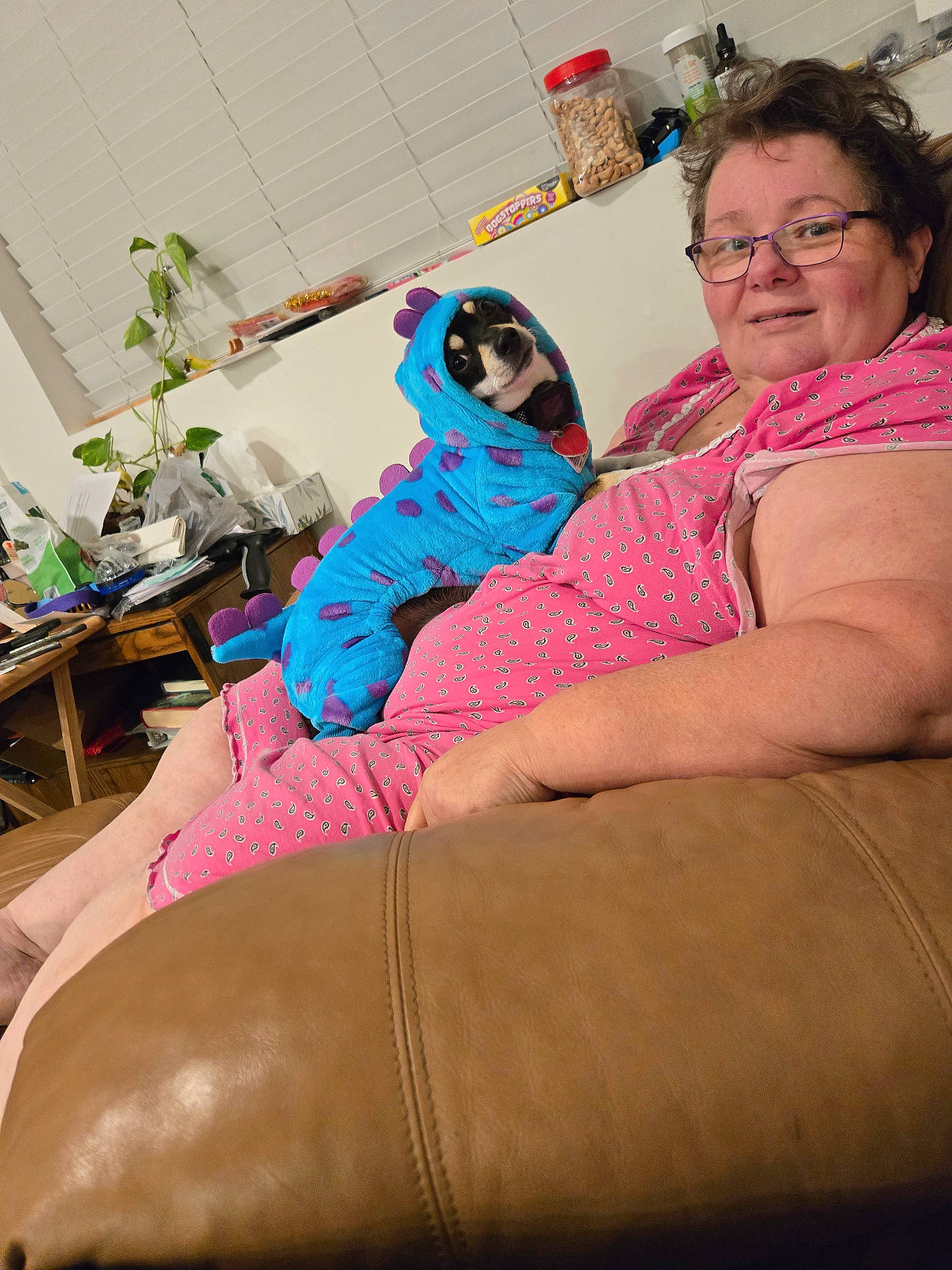 accessories, adult, architecture, bodypart, building, couch, face, female, finger, furniture, glasses, hand, head, indoors, livingroom, person, photography, portrait, room, woman