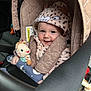 baby, blue_eyes, car_interior, car_seat, child, clothing, cozy, cute, happy, hooded_jacket, infant, playful, plush_toy, portrait, safety, seat, seatbelt, smile, soft_toy, warm
