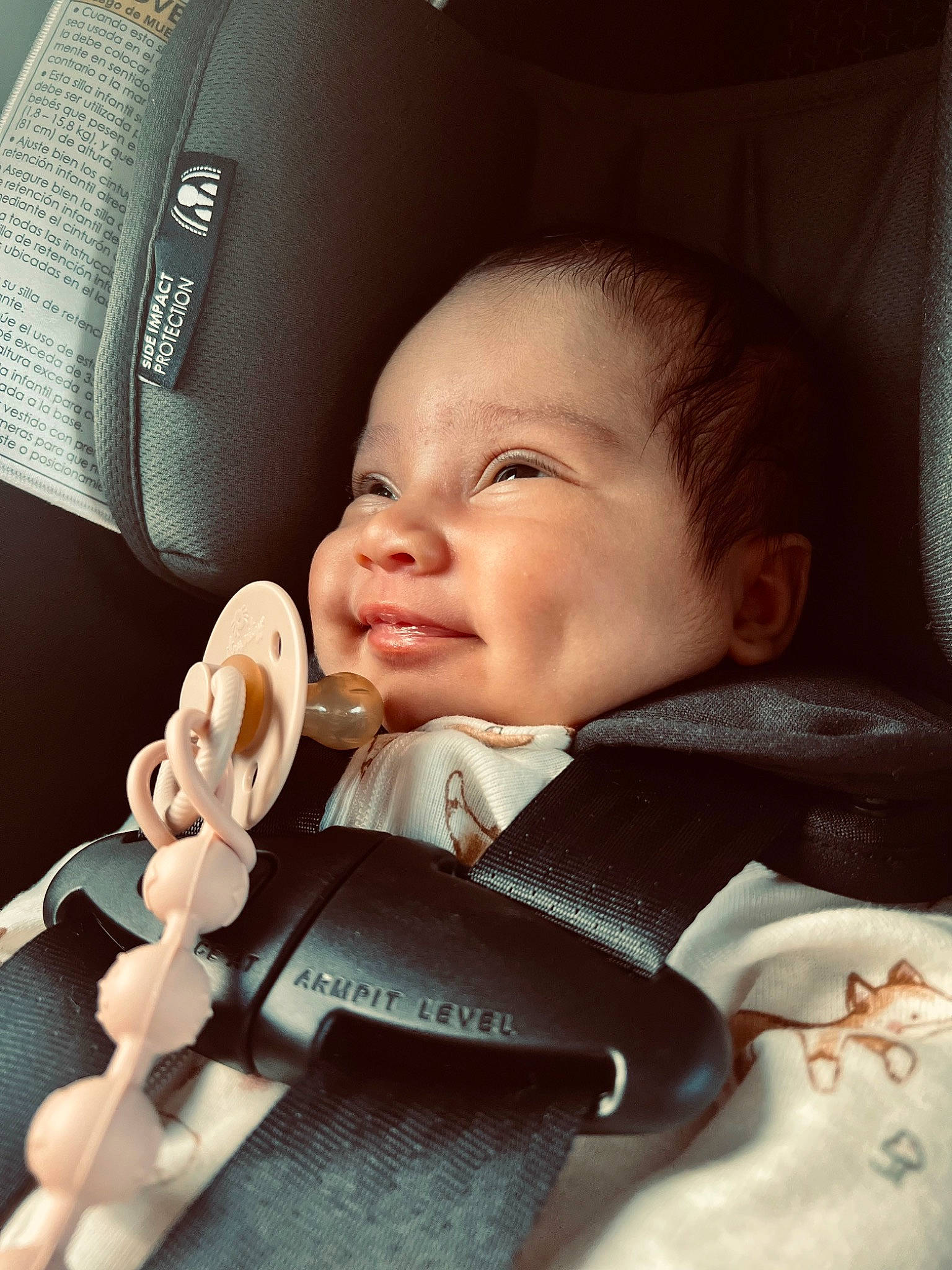 Hazel is registered to the contest to win money with this photo: baby, baby_carriage, baby_in_car_seat, baby_toddler_clothing, car_seat, cheek, child, collar, comfort, cool, eye, finger, flash_photography, happy, head, nose, person, product, skin, smile
