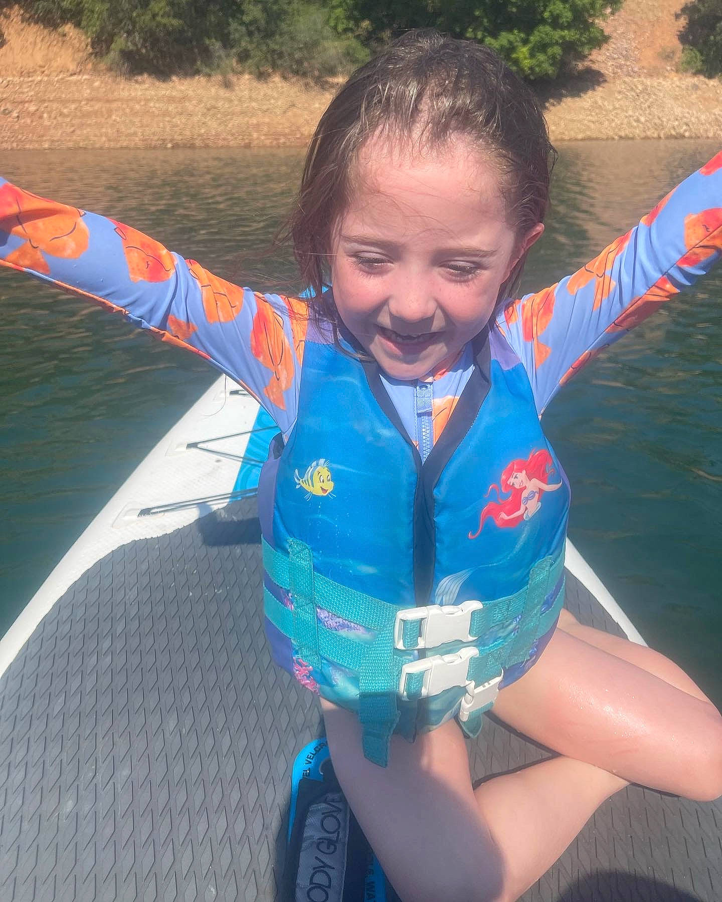 Layanna joined the competition — help win amazing prizes! child, cool, electric_blue, face, fun, gesture, glove, grass, hair, happy, head, joy, leisure, lifejacket, person, personal_protective_equipment, play, recreation, smile, thigh