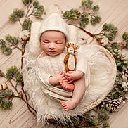 Mattéo participe au concours pour gagner de l'argent avec cette photo : baby, cozy, cute, deer_toy, felt_toy, fluffy_blanket, indoors, infant, knit_hat, knit_outfit, natural_elements, newborn, peaceful, pine_branches, pinecones, portrait, sleeping, soft_lighting, winter_theme, wooden_bowl