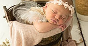 Jenna a rejoint le concours — aidez-le/la à gagner de superbes lots ! baby, newborn, sleeping, bucket, lace, tulle, headband, flower, candle, wooden_bucket, blanket, fabric, dried_flowers, decor, cozy, peaceful, portrait, indoors, soft_lighting, rustic