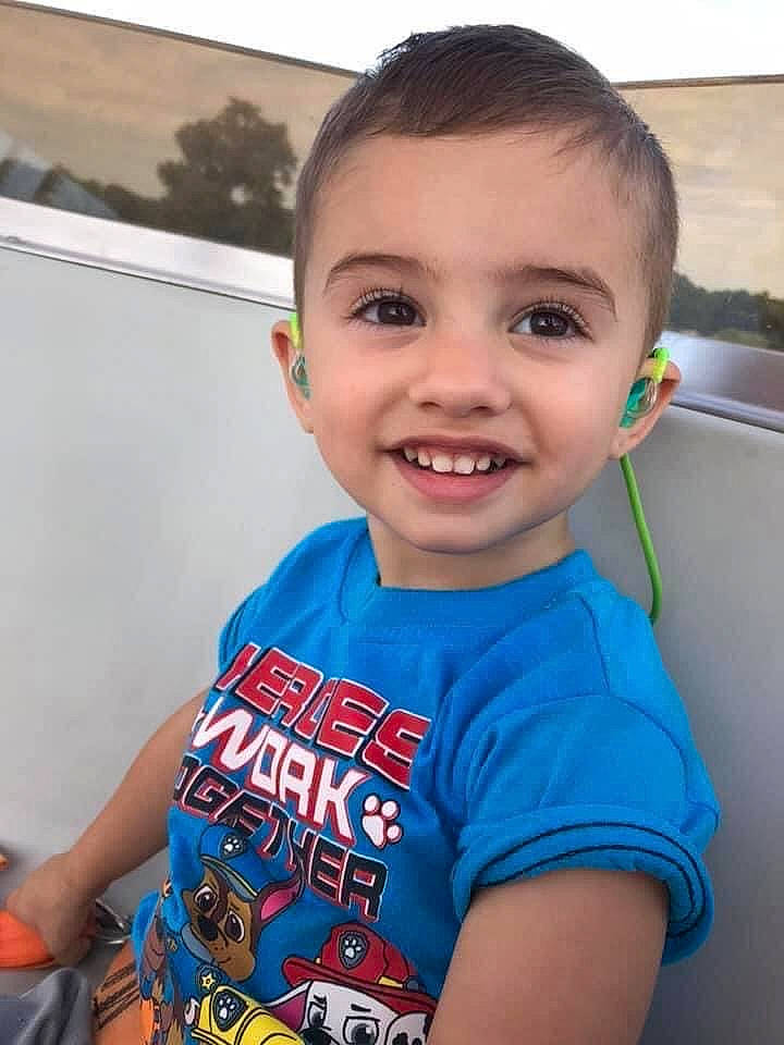 Dawson is registered to the contest to win money with this photo: chair, chest, child, cool, electric_blue, finger, fun, hairstyle, happy, iris, joy, leisure, muscle, neck, people, person, personal_protective_equipment, recreation, shoulder, sitting