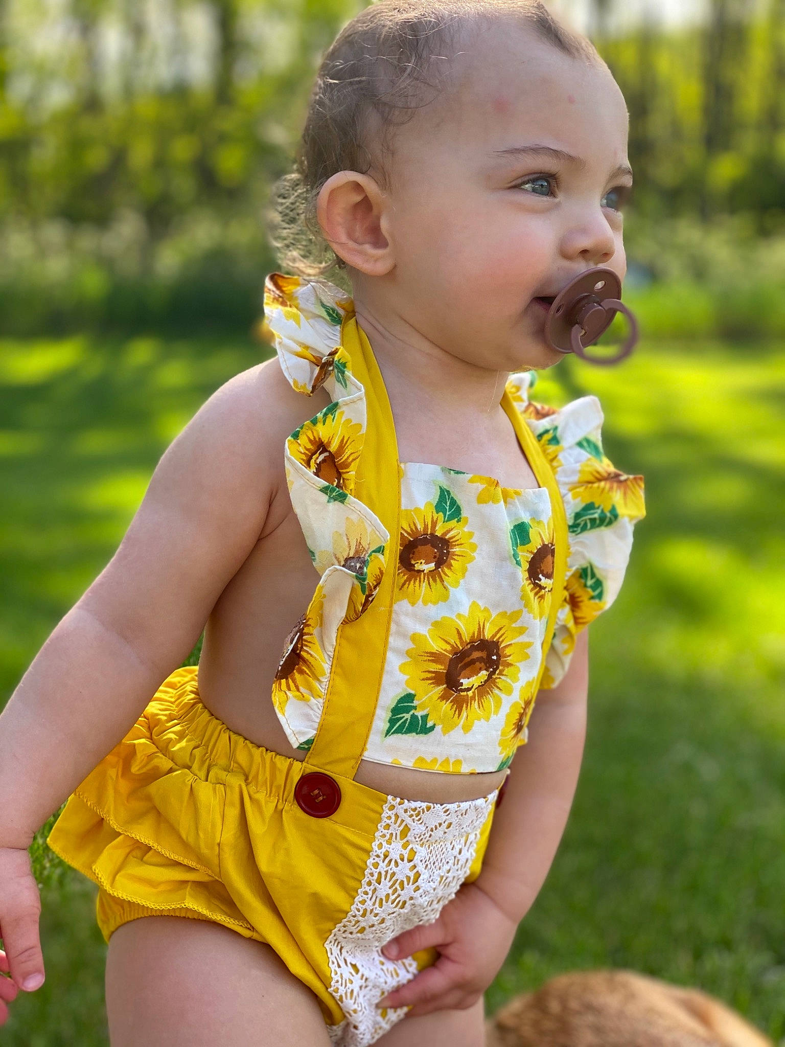 Pyper is registered to the contest to win money with this photo: child, child_model, dress, fashion_accessory, grass, happy, neck, pattern, person, plant, summer, toddler, yellow