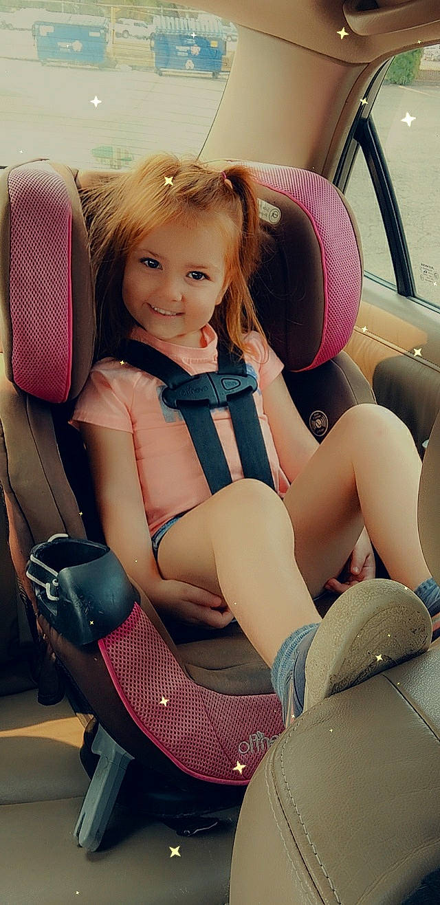 Summitt is registered to the contest to win money with this photo: automotive_design, automotive_exterior, car, car_seat, car_seat_cover, comfort, finger, hairstyle, head_restraint, joy, knee, leg, motor_vehicle, person, shoe, shorts, smile, steering_part, steering_wheel, thigh
