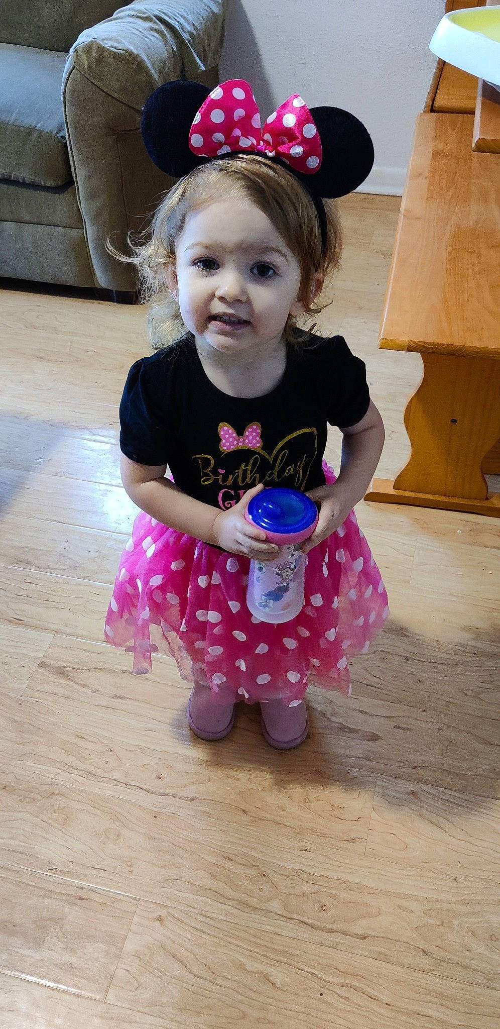 Raeleigh joined the competition — help win amazing prizes! baby, baby_toddler_clothing, child, dress, face, flooring, fun, happy, hardwood, leg, magenta, pattern, person, pink, purple, skin, sleeve, smile, t_shirt, toddler